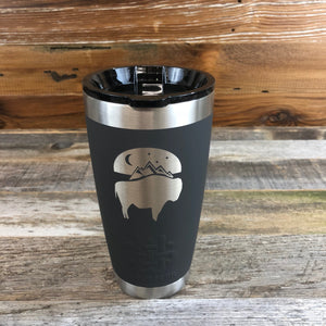 Bison Moon Tumbler | 20 oz | Charcoal The WyoMade Bison Moon Tumbler is pure beverage containment for 20 ounces of your favorite hot or cold drink.  It comes with a smooth-flow sippy-lid for direct beverage enjoyment.  This Charcoal colored Tumbler is designed for any Wyoming lifestyle and will surely allow you to roam free with your favorite beverage.  Bring some life to the herd with a Bison Moon Tumbler from WyoMade.