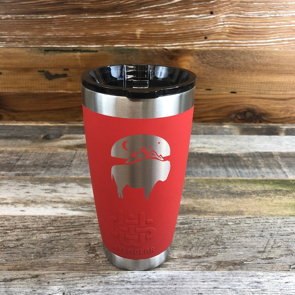 Bison Moon Tumbler | 20 oz | Red The WyoMade Bison Moon Tumbler is pure beverage containment for 20 ounces of your favorite hot or cold drink.  It comes with a smooth-flow sippy-lid for direct beverage enjoyment.  This Red colored Tumbler is designed for any Wyoming lifestyle and will surely allow you to roam free with your favorite beverage.  Bring some life to the herd with a Bison Moon Tumbler from WyoMade.