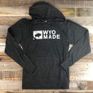 The reinvented WyoMade Apparel Logo Hoodie is now is a modern twist on our long time iconic design from WyoMade Apparel!   The Bison represents freedom and is a staple of Wyoming's open spaces. This Charcoal Hoodie is sure to appease your desire to roam free.  Be a part of the herd in a comfy Bison Moon Hooded Long Sleeve deigned for both men and women.   Offering sizes ranging from XS- 2XL!  WyoMade is a Wyoming Craft Apparel brand located in the heart of Downtown Casper, Wyoming. 