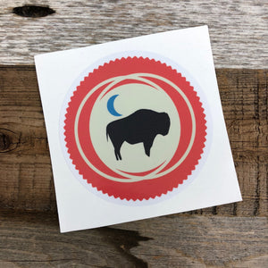 The New Bison Moon is a modern twist on our long time iconic design from WyoMade!   The Bison represents freedom and is a staple of Wyoming's open spaces. This sticker is sure to appease your desire to roam free.  Be a part of the herd with the Backwoods Bison from Wyomade.        Size:  3.5